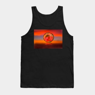 Glass globe on sunset background Tank Top